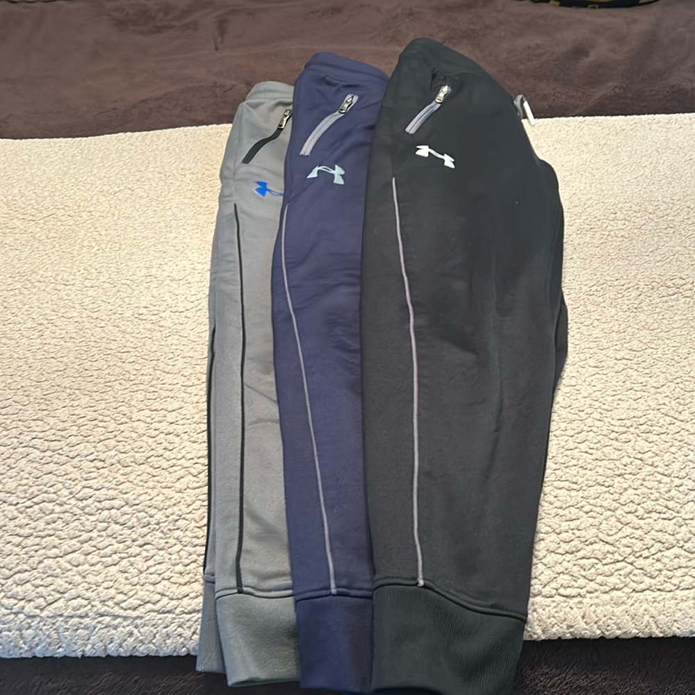 Three pairs of Under Armour boys pants, youth small